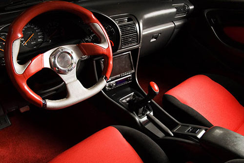 Tuned sport car. Luxury red velvet interior