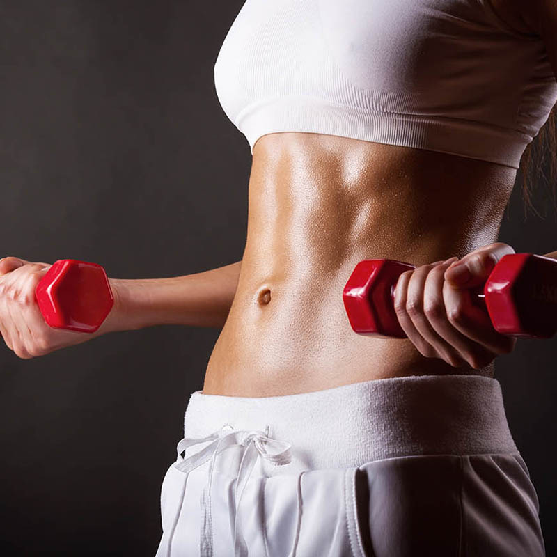 Woman with dumbbells