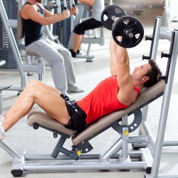 group with weight training equipment on sport gym