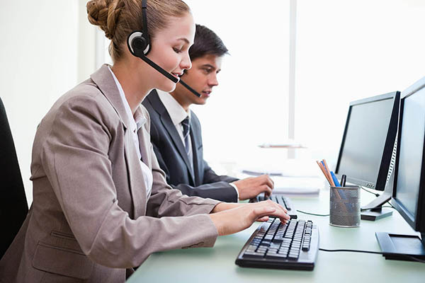 Operators working with computers