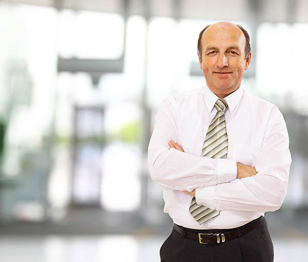 Portrait of a happy successful mature business man