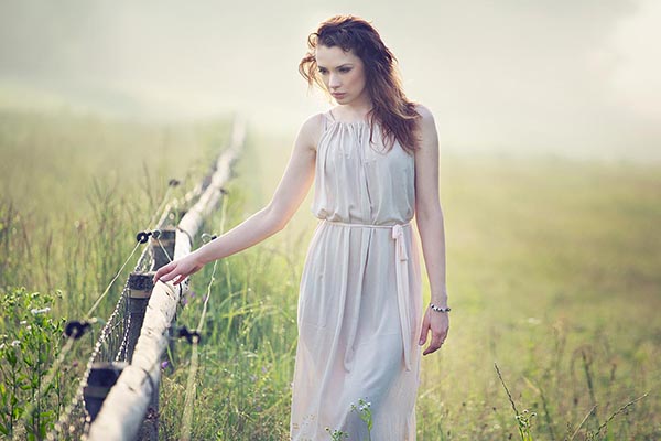 Serious look of young delicate woman
