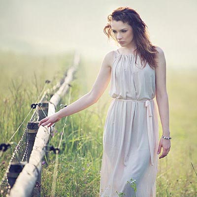 Serious look of young delicate woman